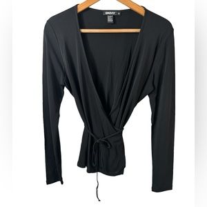 DKNY black classic wraparound top in size medium.